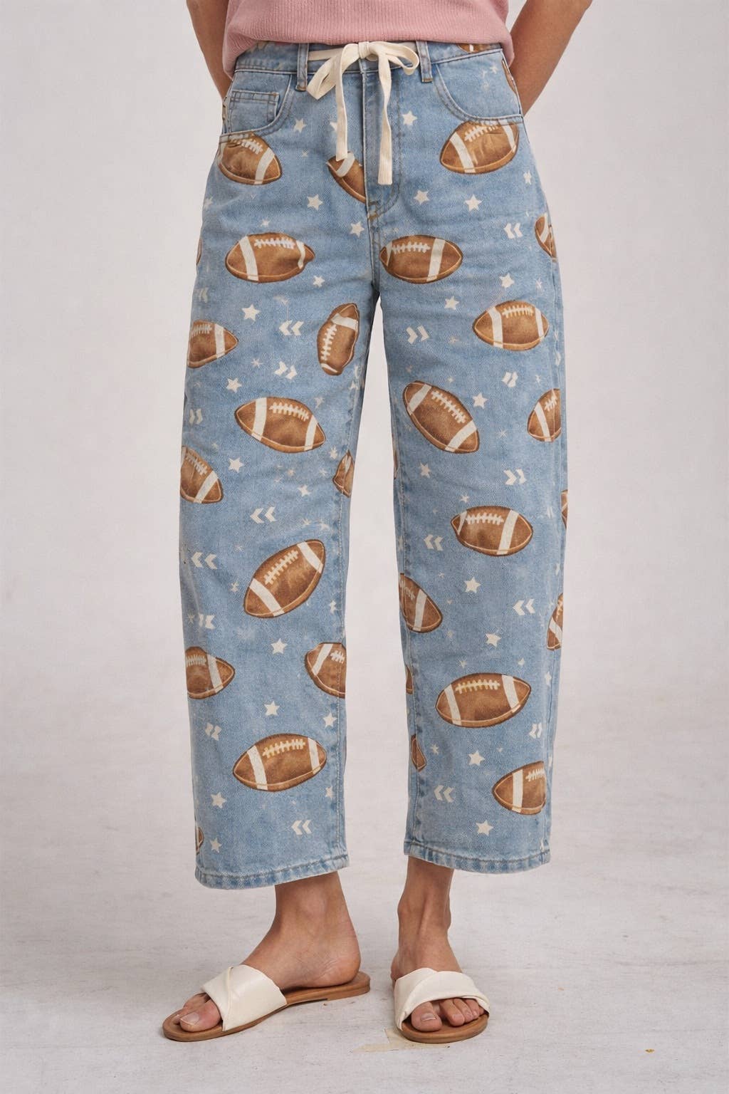 GAME DAY PRINT MID RISE DENIM JEANS PANTS