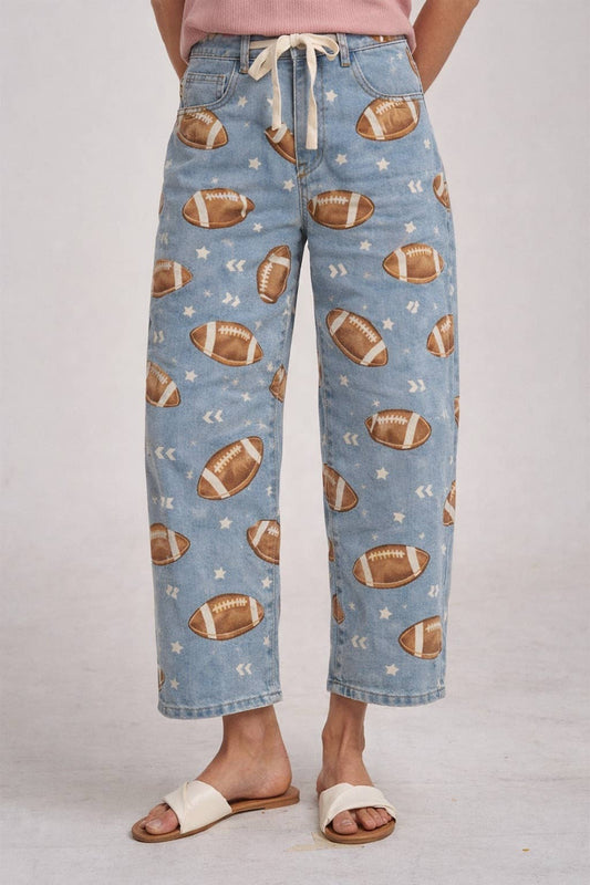 GAME DAY PRINT MID RISE DENIM JEANS PANTS