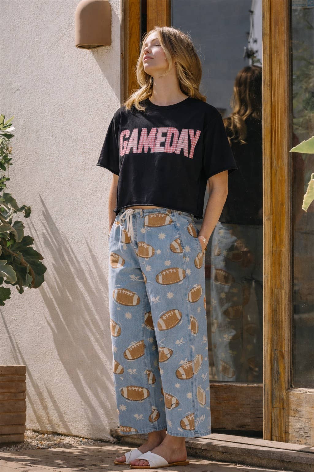 GAME DAY PRINT MID RISE DENIM JEANS PANTS