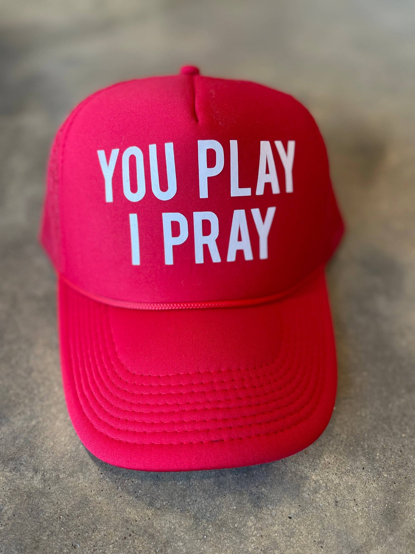 You Play, I Pray Trucker Hat