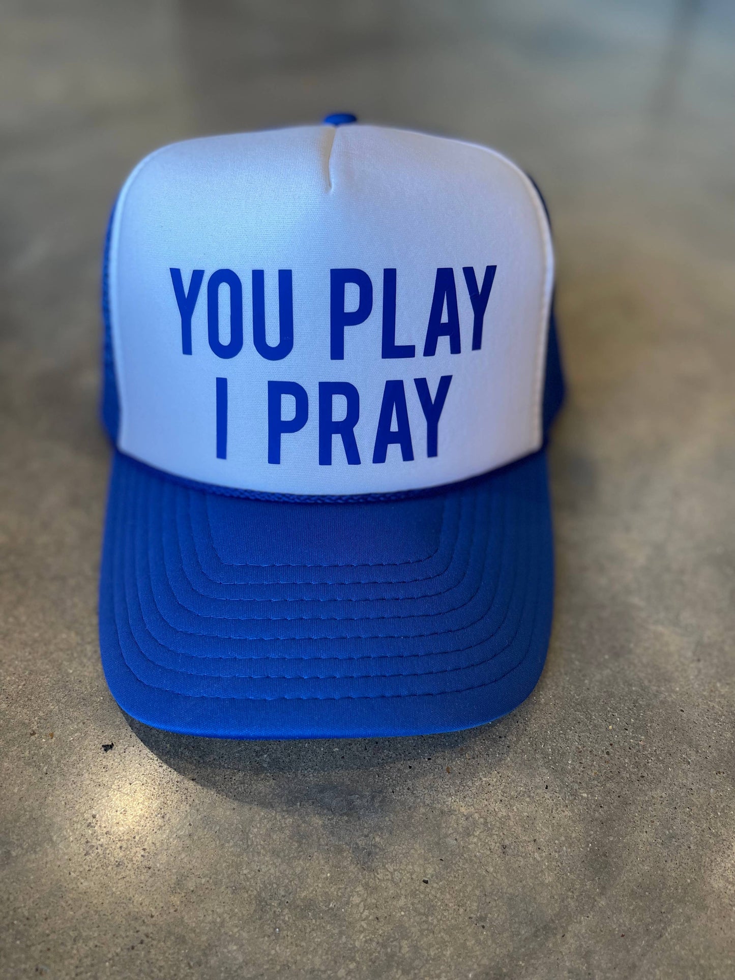 You Play, I Pray Trucker Hat