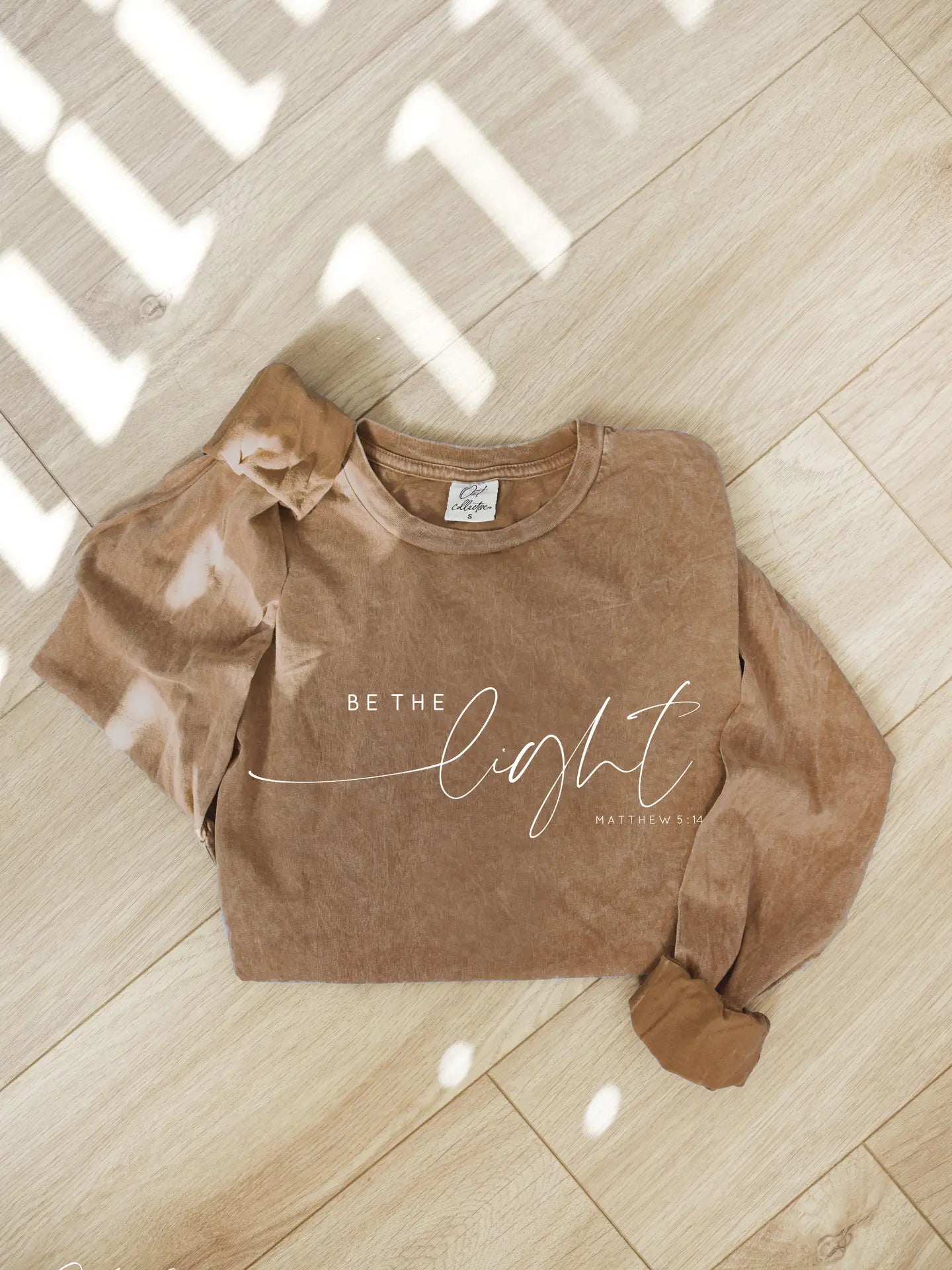 BE THE LIGHT Mineral Washed Long Sleeve Graphic