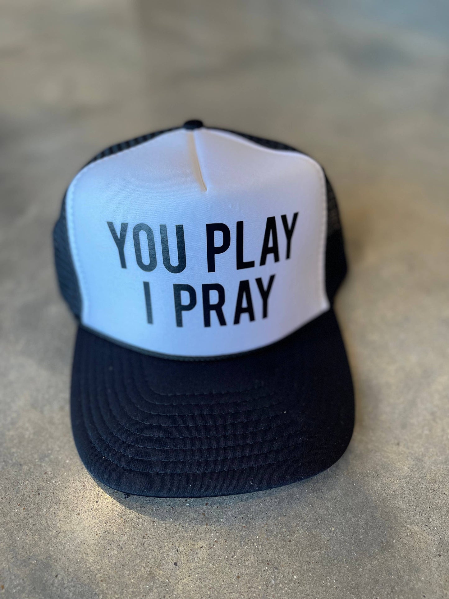 You Play, I Pray Trucker Hat
