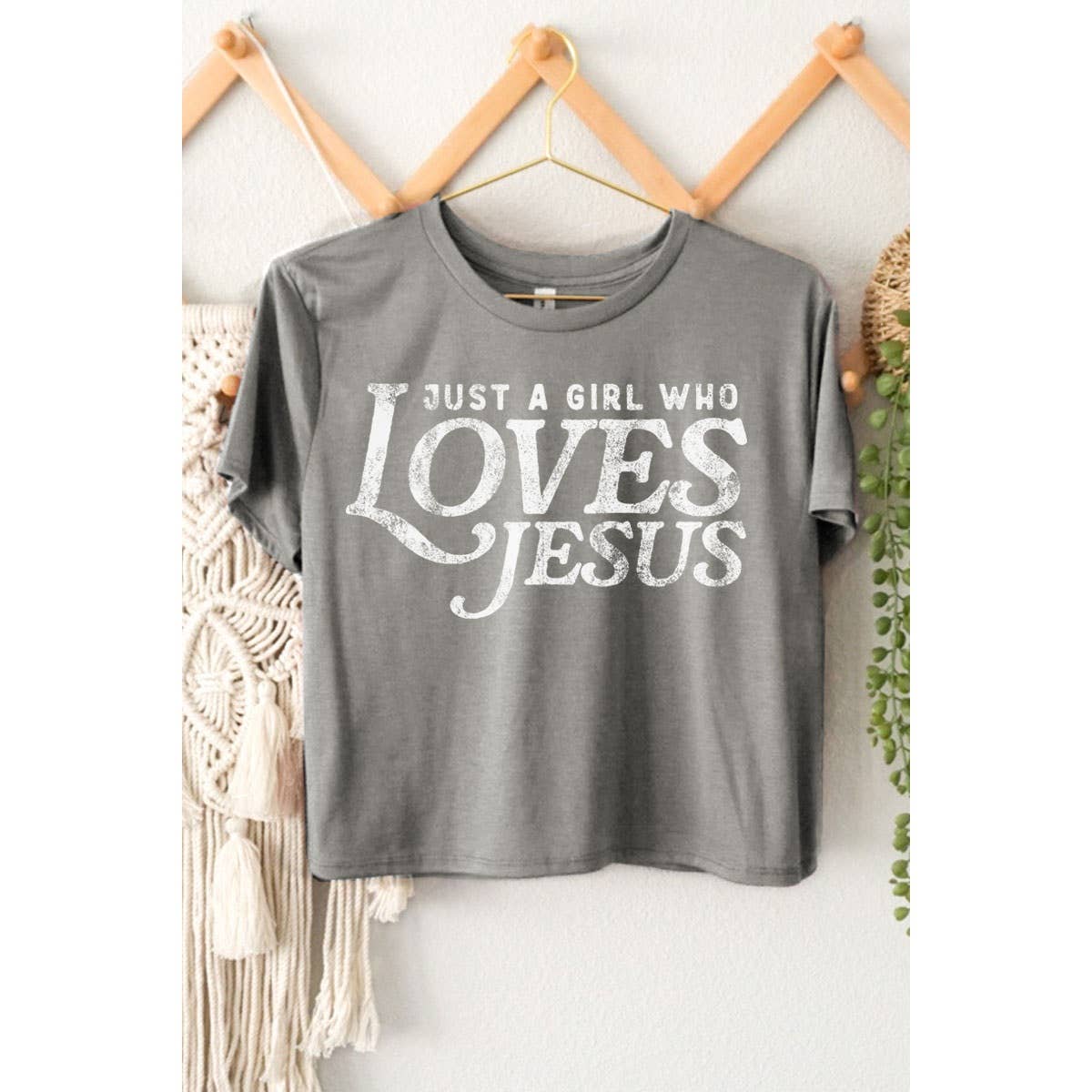 JUST A GIRL WHO LOVES JESUS GRAPHIC CROP TOP